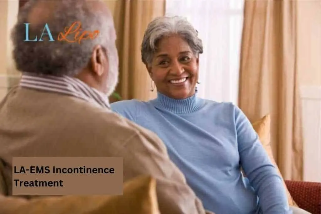 Couple sat smiling at each other - LA-EMS treatment Oxfordshire
