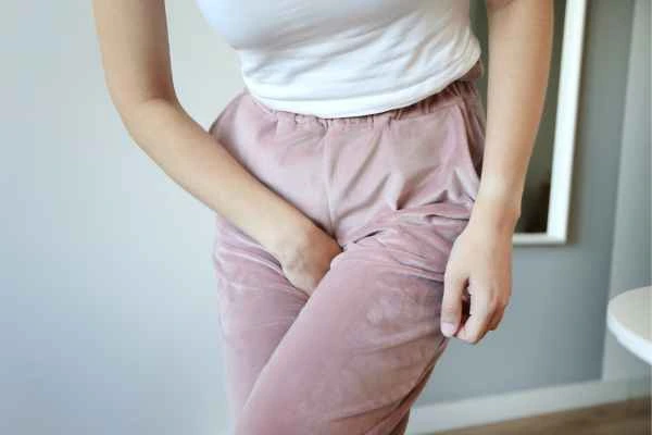 older woman running to the toilet because of urinary incontinence Oxfordshire